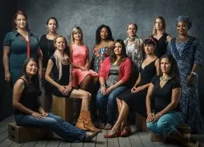 Twelve women scientists, TED Fellows, posing together for a group portrait